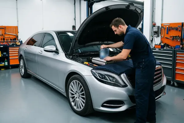Mechanic Nation Mercedes-Benz maintenance and diagnostics on the hoist