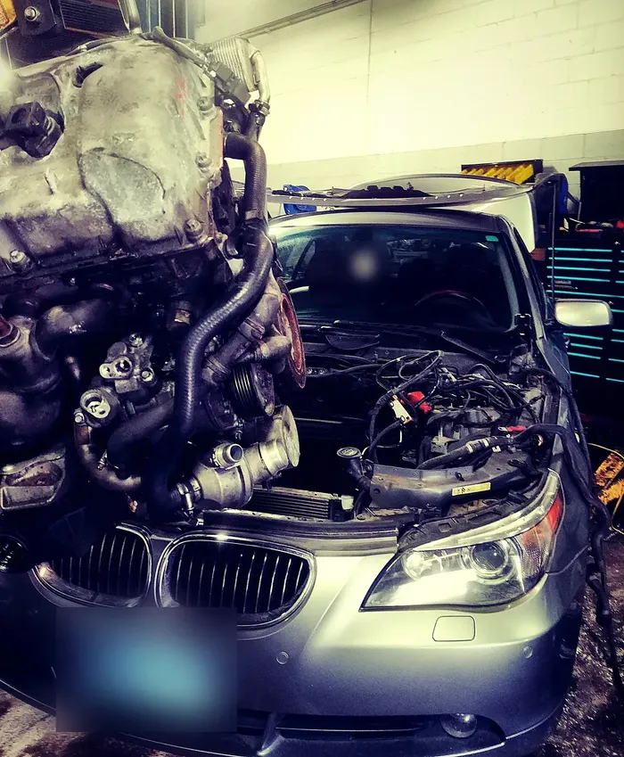 Mechanic Nation real work: Engine bay of the E60 with the engine out