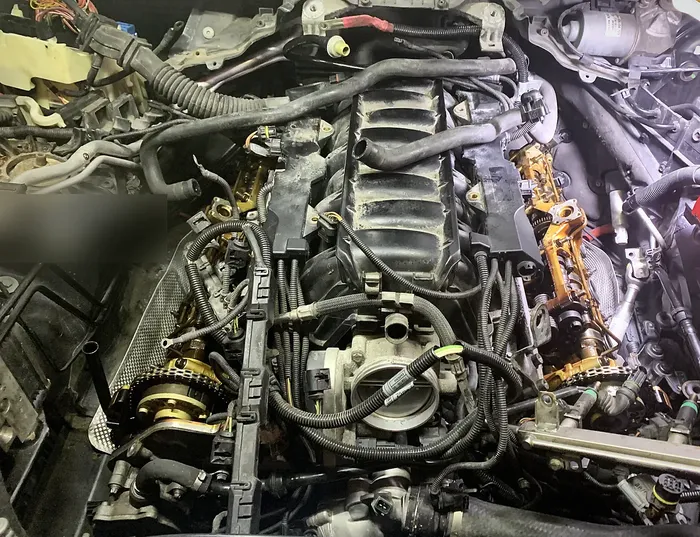 Mechanic Nation real work: BMW N62 V8 with the valve covers removed